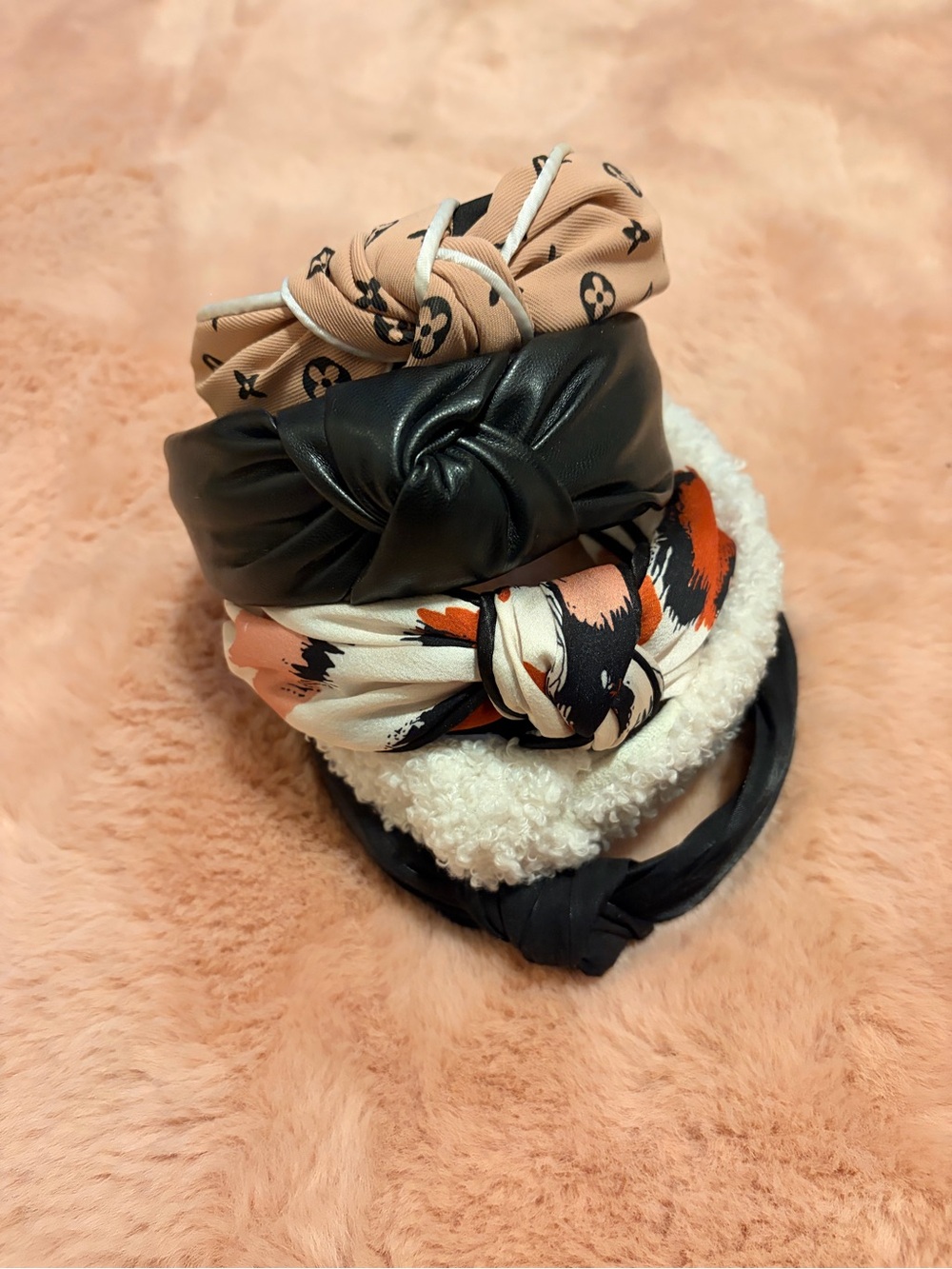 Stack of Women’s Knotted Headbands - Black, Beige, Cream, Patterned